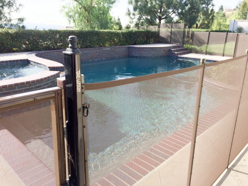 Mesh Fence with Pool in Background